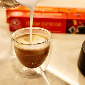 Adding frothy cream to Nespresso originalline espresso from The Coffee Bean & Tea Leaf